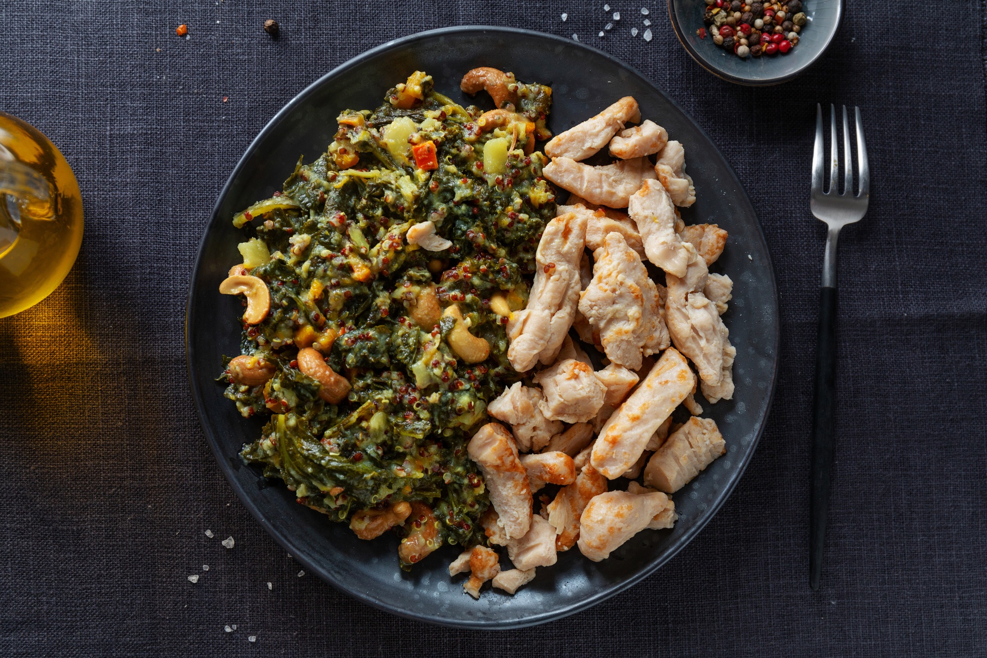 Green kale salad with chicken on plate
